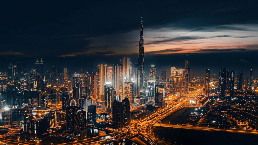 Panoramic view of the Dubai skyline at dusk, with the Burj Khalifa at its center, representing the booming prime real estate market that ranks top 3 globally for capital growth.
