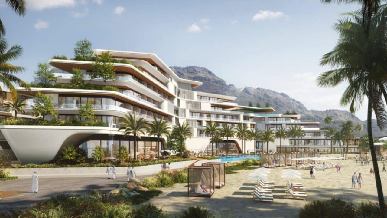 A modern family enjoying the community amenities in a new Sharjah real estate development.